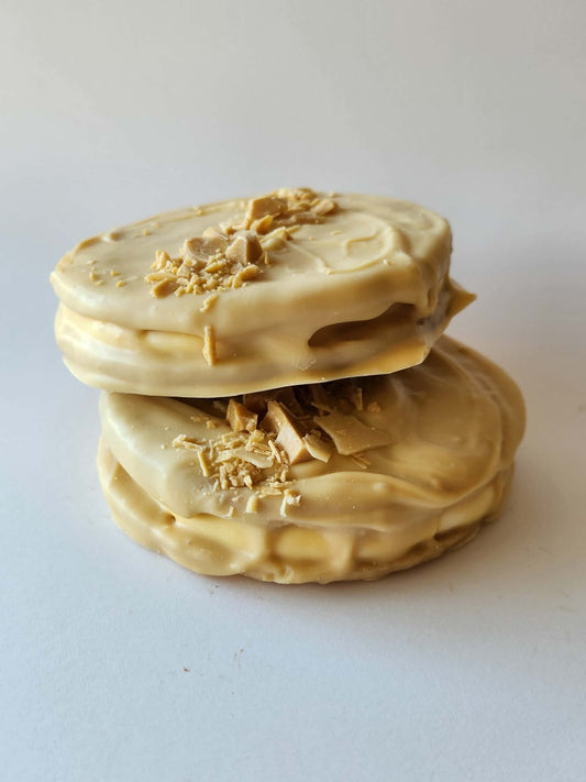 Kai's Sweet Co Caramilk Roundabout two stacked, white Caramilk chocolate coated with Caramilk crumble topping
