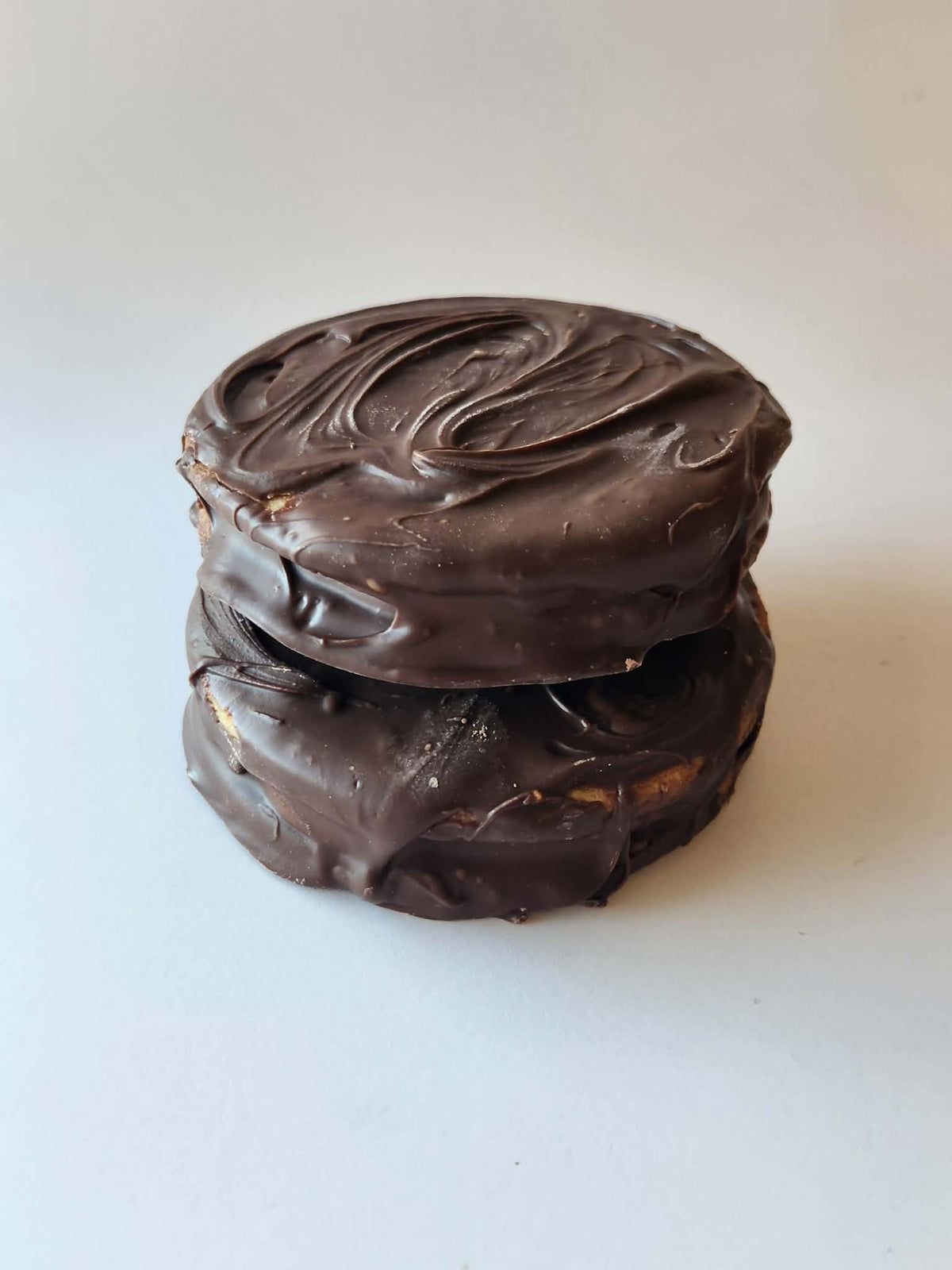 Kai's Sweet Co Nutella Roundabout two stacked, milk chocolate coated with chocolate swirl top, handmade sweet treat