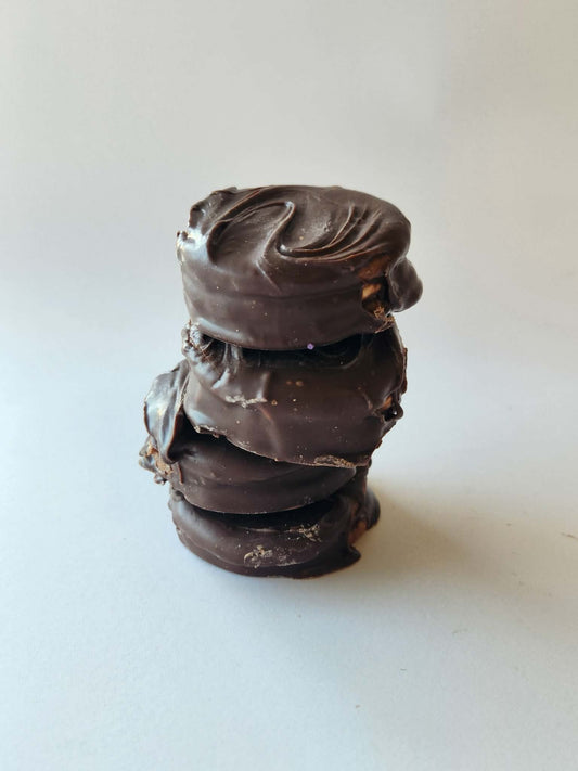 Kai's Sweet Co Nutella Mini Roundabouts stacked four high, dark chocolate coated handmade treats